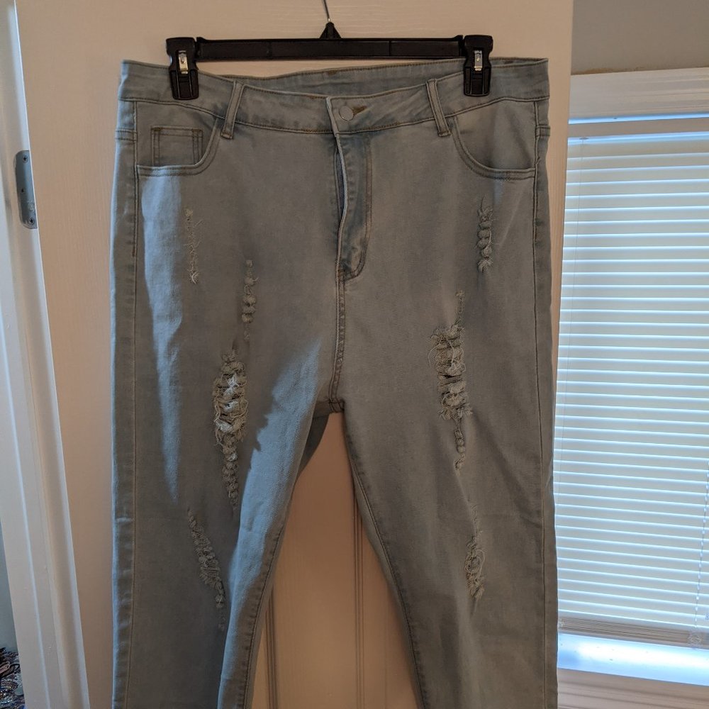 Distressed Light Blue Jeans